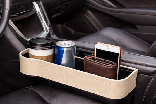 Car organizer with drinks and phone inside a vehicle