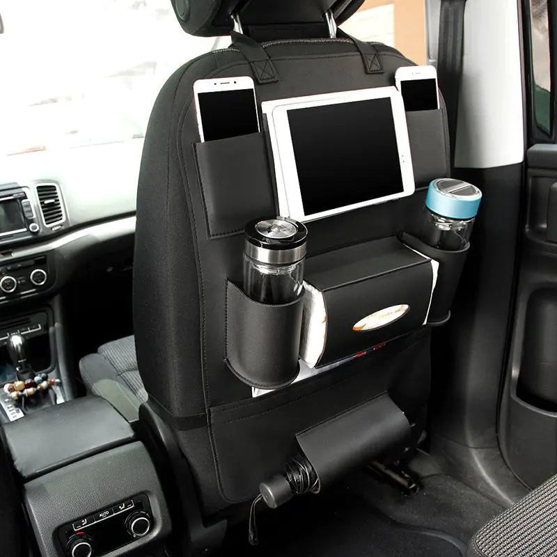 Car seat organizer with phone holder, tablet stand, and cup holders in a vehicle.