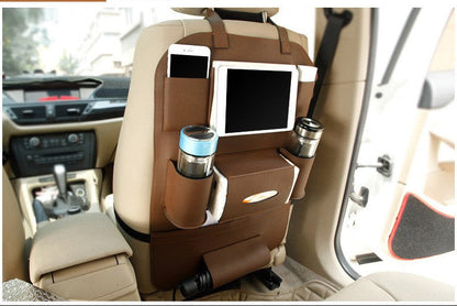 Car seat organizer with cup holder and phone stand in a vehicle interior.
