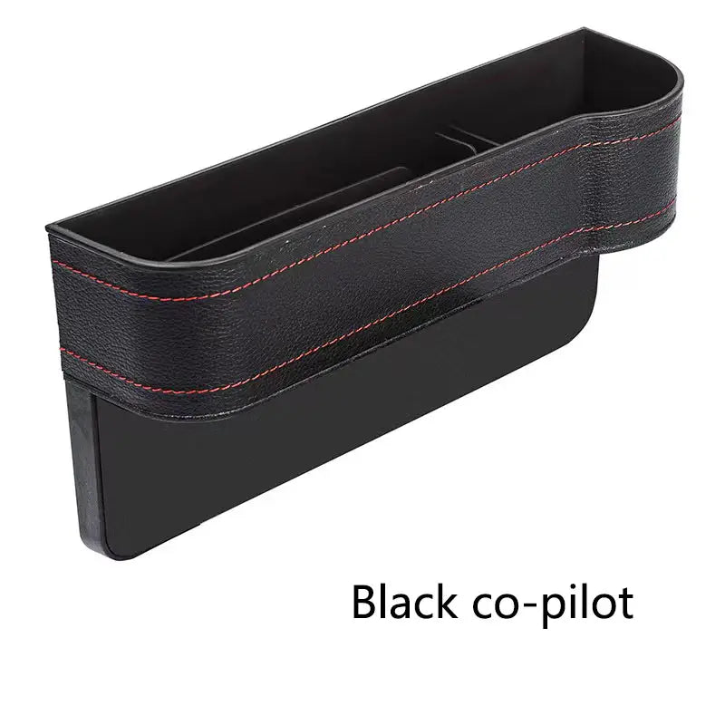 Black car organizer with red stitching on a white background